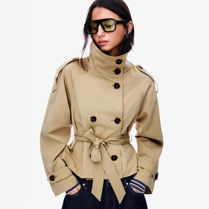 Ladies short tailored trench coat with high button placket and waist belt Mune Fashion