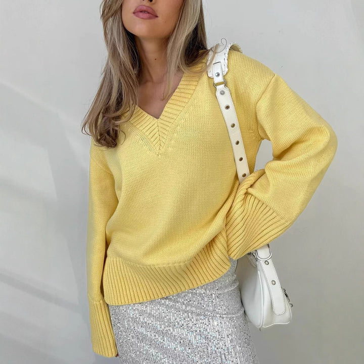 Women’s oversized fine knit sweater with deep V-neckline, ribbed cuffs and loose silhouette Mune Fashion
