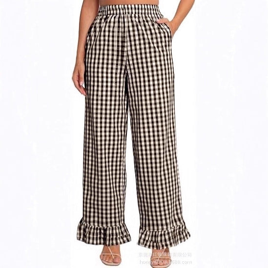 Women's palazzo pants with elastic waistband, side pockets, and ruffled hem Mune Fashion