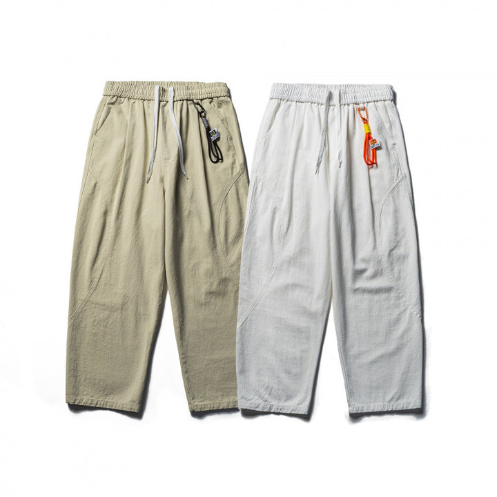 Unisex locker cut cropped leisure pants with elastic waistband, drawstring, and carabiner detail Mune Fashion