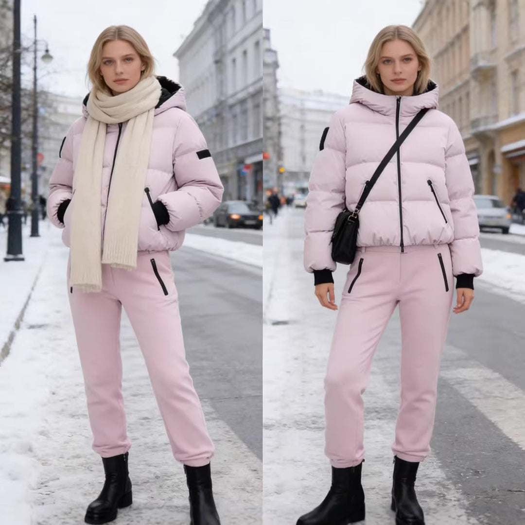 Women's short padded bomber-style hooded jacket with elastic hem and zippered pockets Mune Fashion
