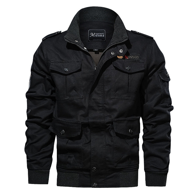 Men's rugged field jacket with multiple pockets, quilted inner lining, and ribbed cuffs.