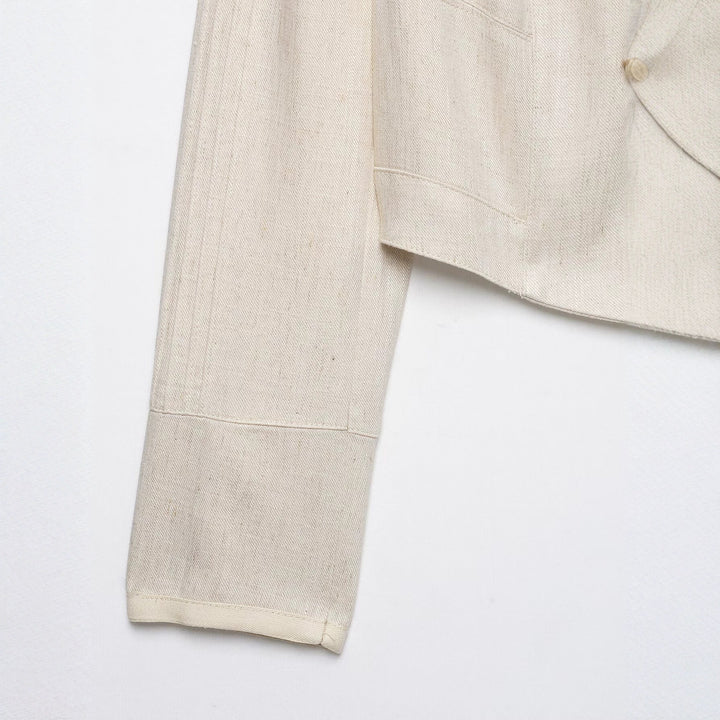 Women's cropped jacket made of linen blend with stand-up collar, decorative button placket and ruffle detail Drune