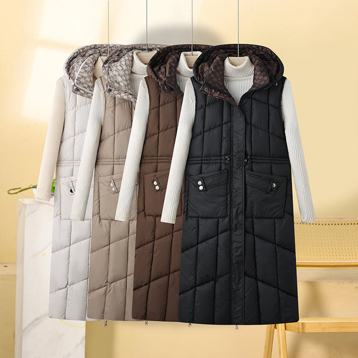 Ladies long sleeveless thermo quilted coat with hood, adjustable drawstring waist and multifunctional pockets Mune Fashion