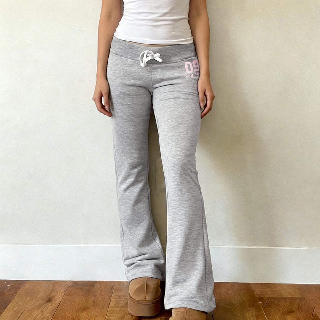 Women's flared high waist lounge pants with elastic comfort waistband, adjustable drawstring, and wide flare Mune Fashion