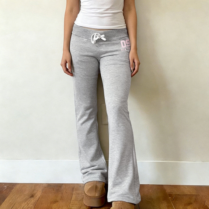 Women's flared high waist lounge pants with elastic comfort waistband, adjustable drawstring, and wide flare Mune Fashion