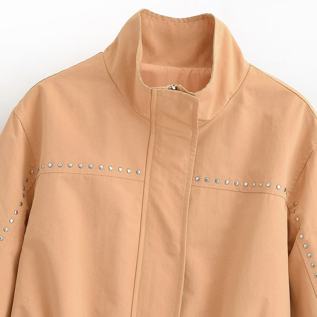 Women's short jacket with studded detailing, stand-up collar and belted waist Mune Fashion
