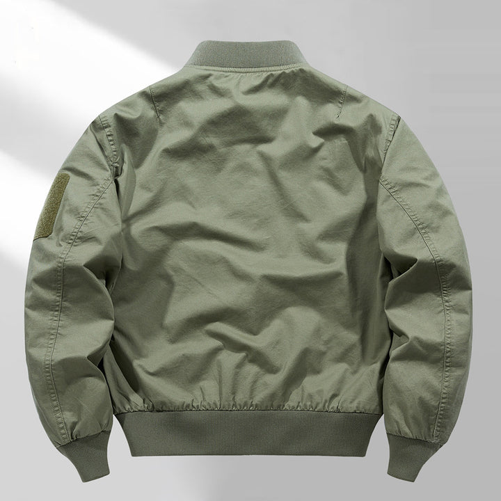 Men's short-cut lightweight bomber jacket with tactical sleeve patch and durable function shell Mune Fashion