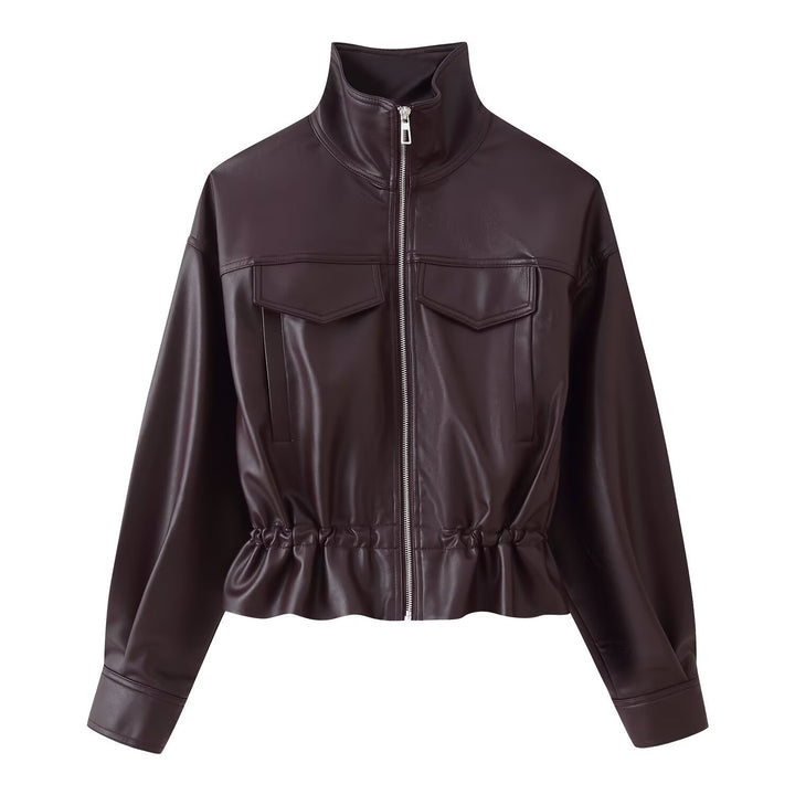 Women's short bomber jacket made of synthetic leather with a high stand-up collar, chest pockets, and drawstring waist Mune Fashion