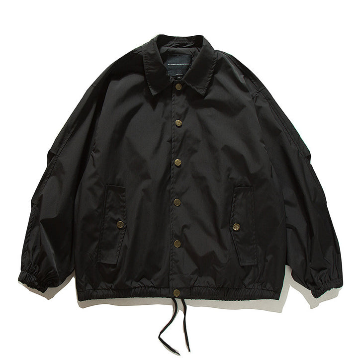 Unisex Boxy transitional bomber jacket with drawstring hem and snap button placket Mune Fashion