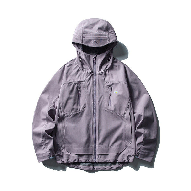 Unisex Technical Softshell Field Jacket with welded seams, four zippered pockets, and extended back part Mune Fashion