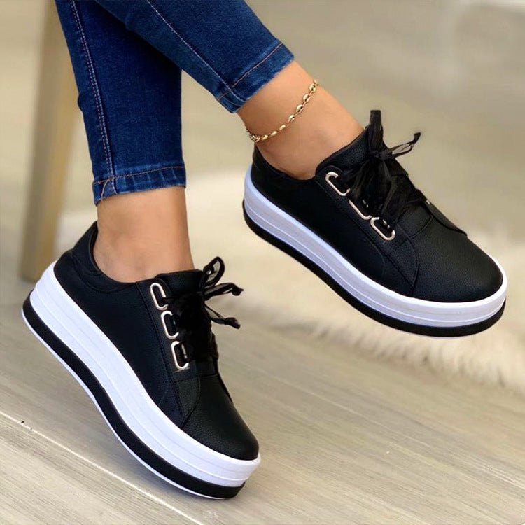 Ladies' platform lace-up shoe with extra high rubber platform, metallic eyelets, and padded entry Mune Fashion