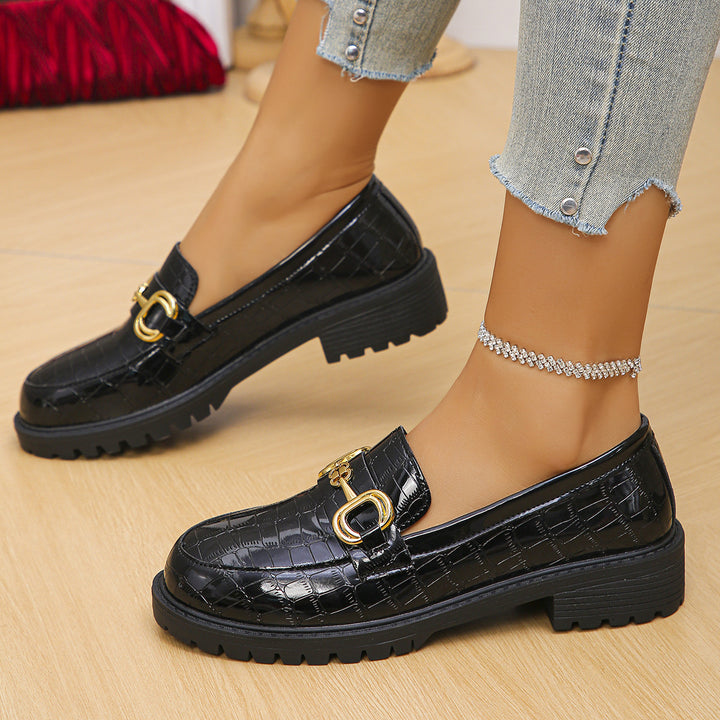 Women's loafers with glossy crocodile embossing, featuring a profiled tractor sole and golden decorative buckle Mune Fashion