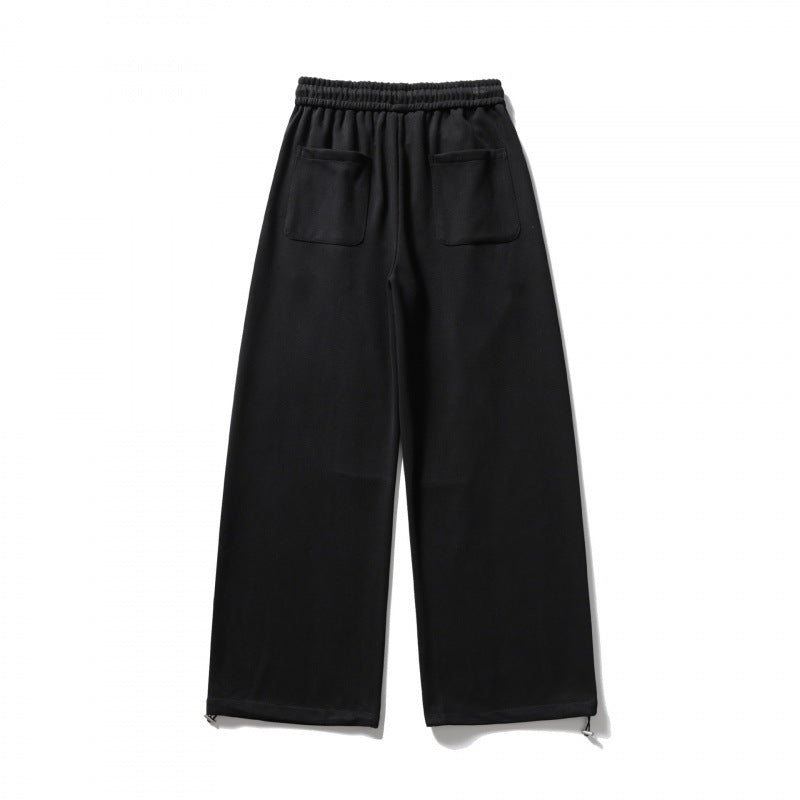 Unisex Wide Sweatpants with drawstring waistband, cord drawstring, and adjustable leg straps Mune Fashion