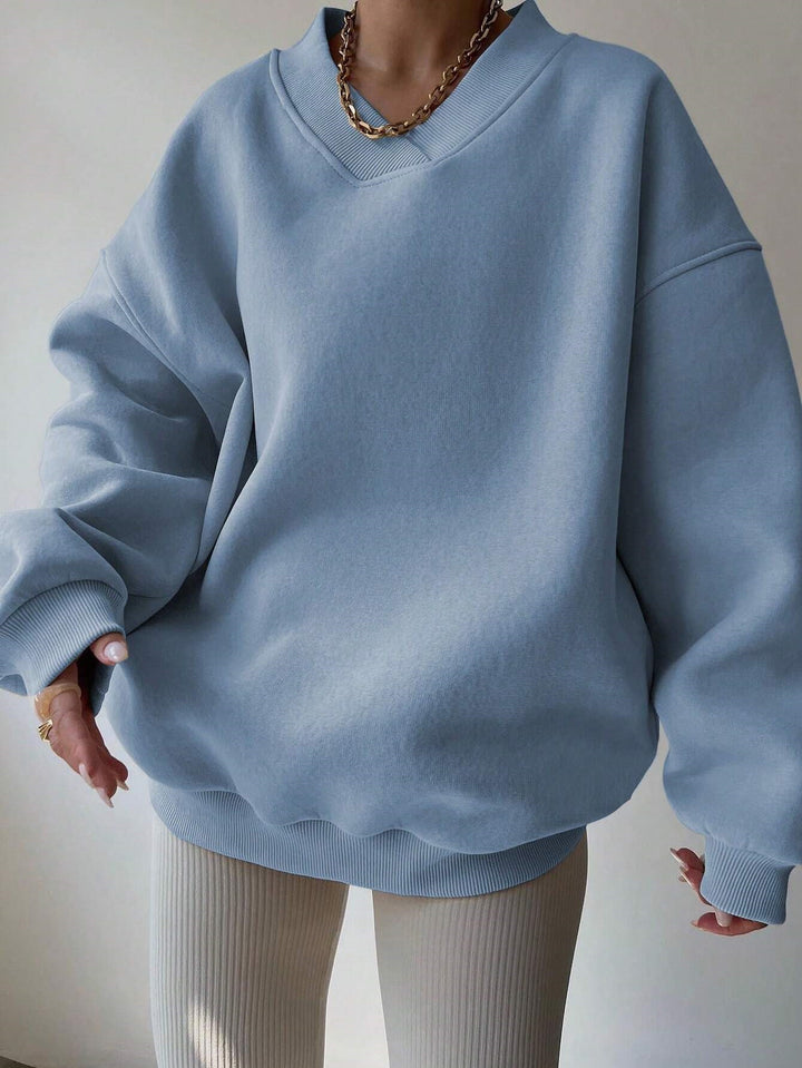 Women's Oversized V-Neck Sweatshirt with Reinforced Ribbed Collar and Extra Wide Cut Mune Fashion