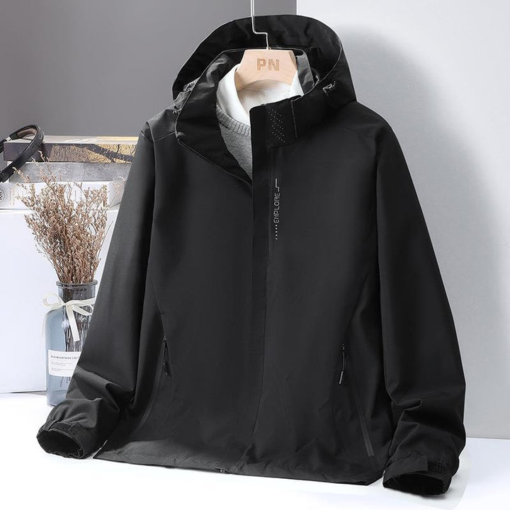 Women's Lightweight Softshell Hooded Jacket with Windproof Storm Flap and Concealed Zipper Pockets Mune Fashion