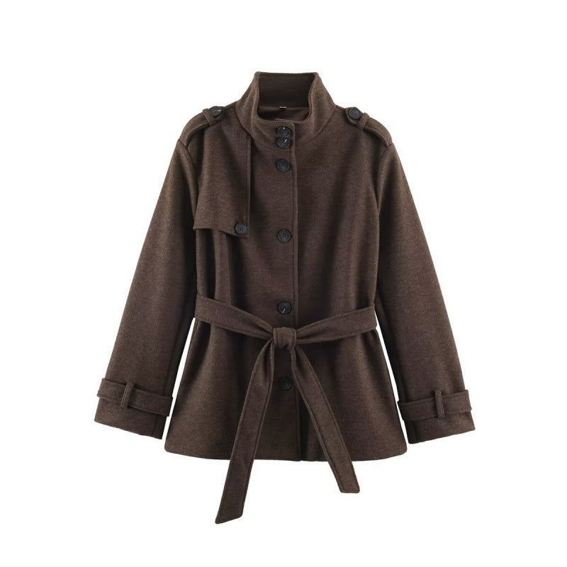 Women's short tailored coat jacket made of wool blend with standing collar, shoulder patches, and tie belt Mune Fashion