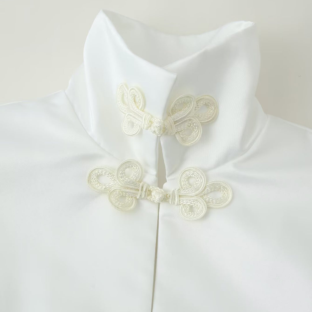 Women's short jacket with stand collar and decorative knot closures Mune Fashion