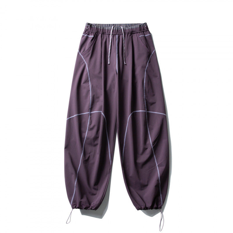 Unisex locker cut tech jogging pants with elastic waistband, distinctive flatlock seams and drawstring Mune Fashion