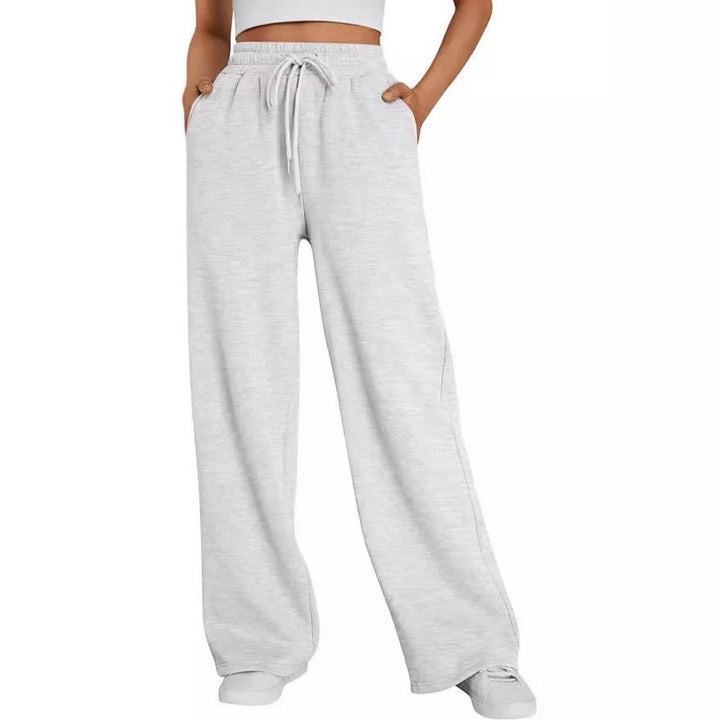 Women's wide lounge pants with high elastic waistband, adjustable drawstring and flowing palazzo silhouette Mune Fashion