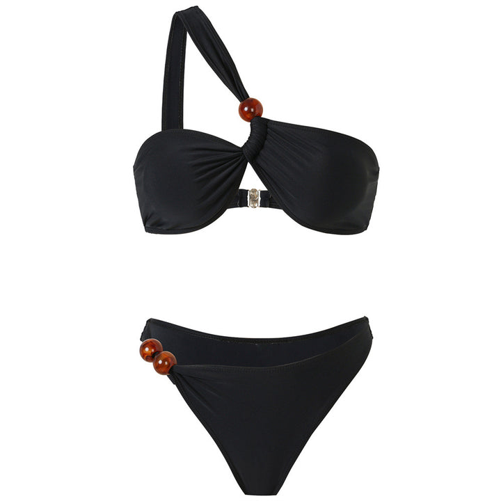 Women's bikini set with asymmetric halter neck and decorative pants buttons Mune Fashion