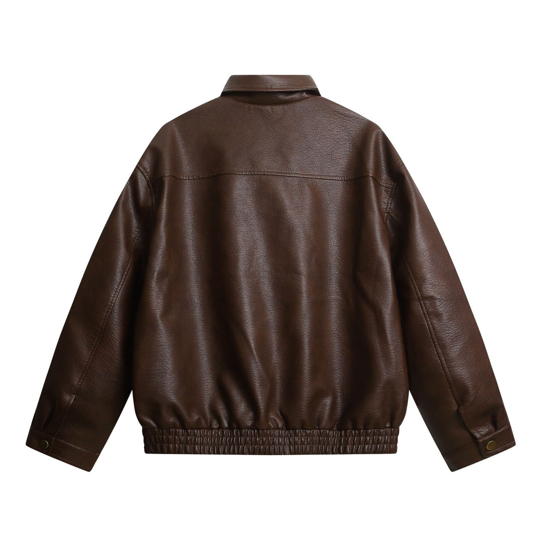Women's short faux leather jacket in oversized look with flap pockets Mune Fashion