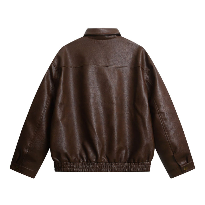 Women's short faux leather jacket in oversized look with flap pockets Mune Fashion