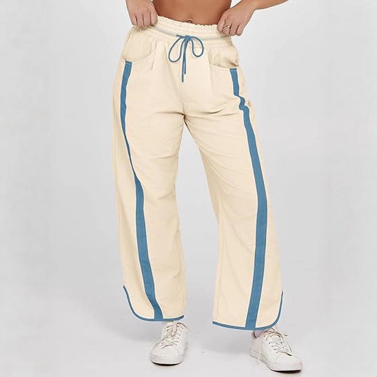Women's nan relaxed track pants with side contrast stripe, elastic smocked waistband, and side pockets Mune Fashion