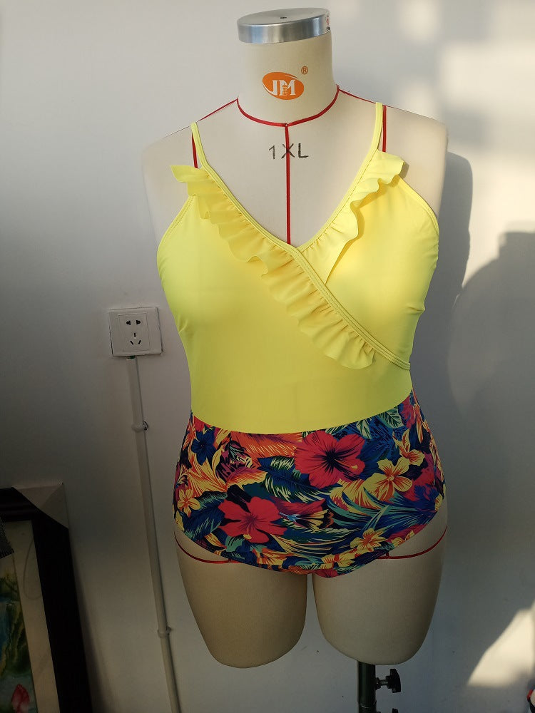 Women's one-piece swimsuit with asymmetrical ruffle design and floral pant area Mune Fashion