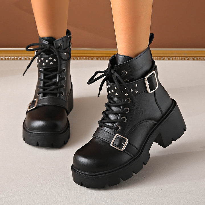 Women's rugged lace-up biker boots with decorative studded straps, side zipper, and textured platform sole Mune Fashion