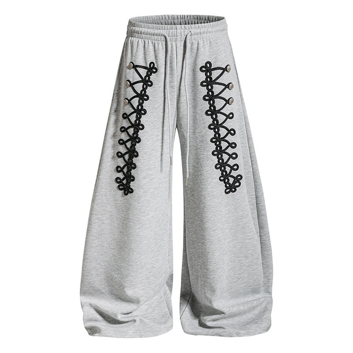 Women's loose jogging pants with elastic waistband and decorative lacing Mune Fashion