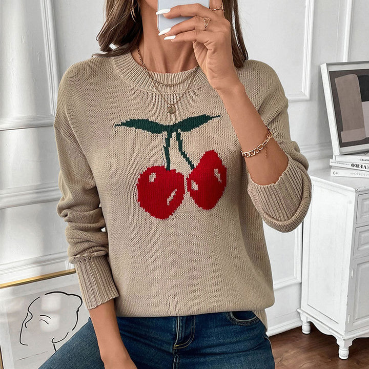 Women’s knitted sweater with cherry intarsia, round neck and casual oversized fit Mune Fashion