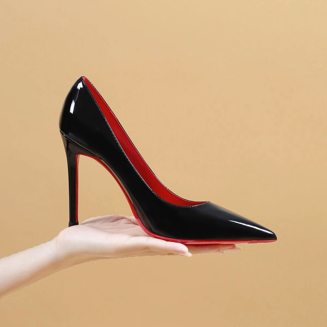 Ladies' pointed pumps with high stiletto heel and strap