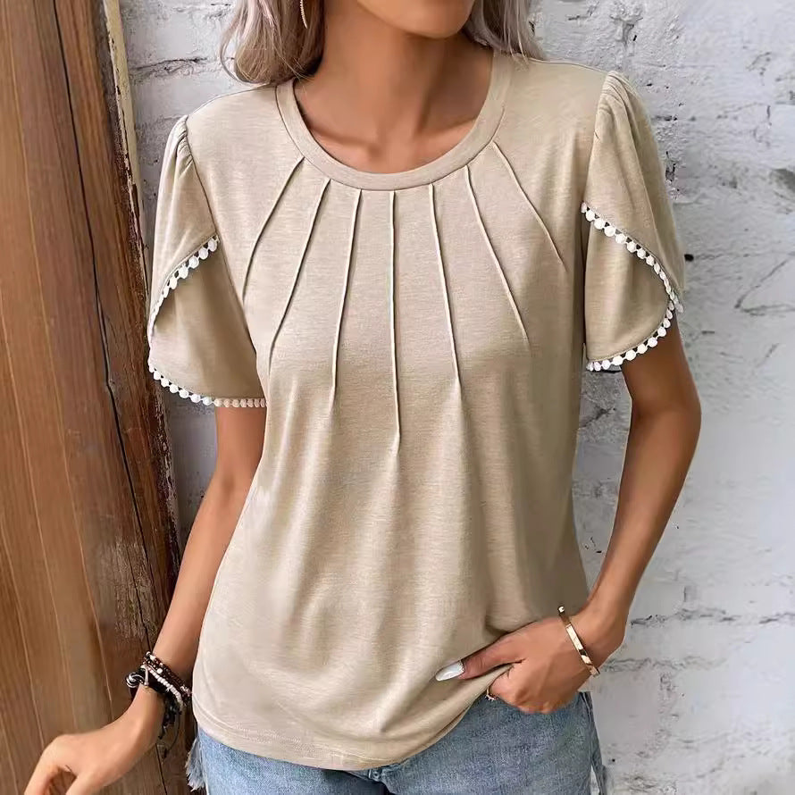 Women's round neck shirt with decorative pleated front, flutter sleeves and pompom trim Mune Fashion