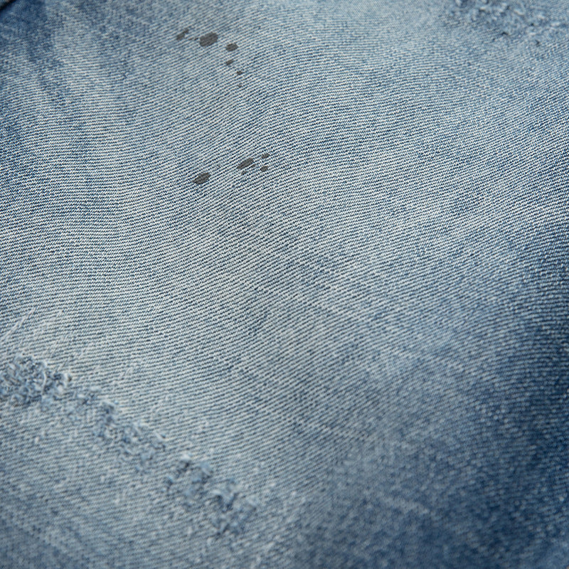 Women's loosely cut high-waisted jeans in a used look with frayed details and decorative seams Mune Fashion