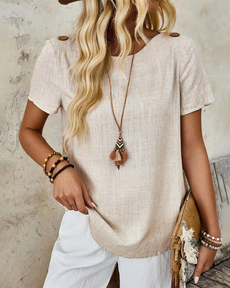 Women's relaxed fit linen blend tunic top with round neckline, wooden button details on the shoulder and curved hem Mune Fashion