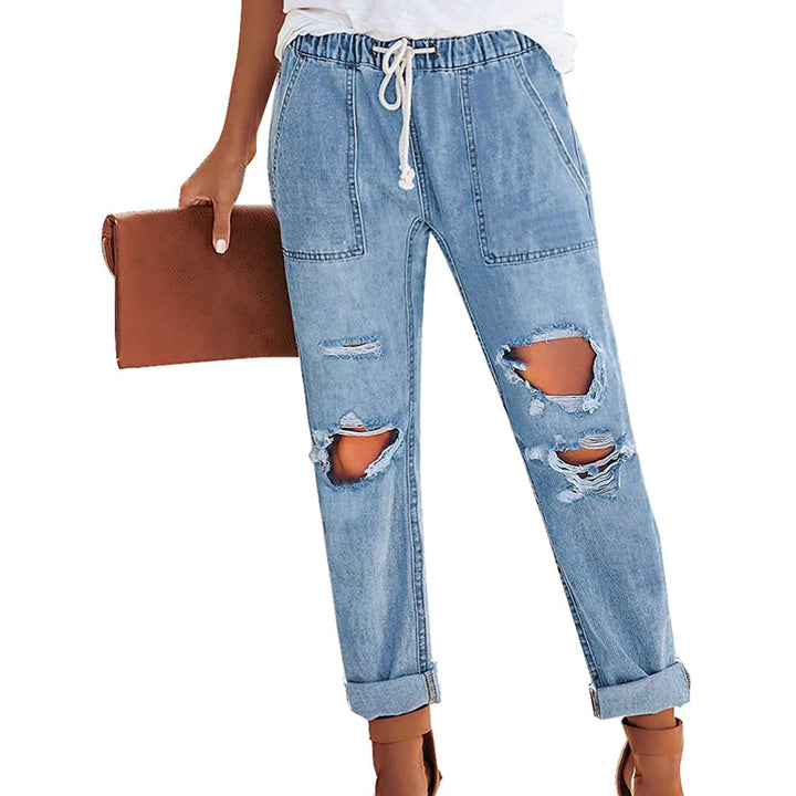 Women's casual destroyed denim jogger with elastic drawstring waistband and patch front pockets Mune Fashion
