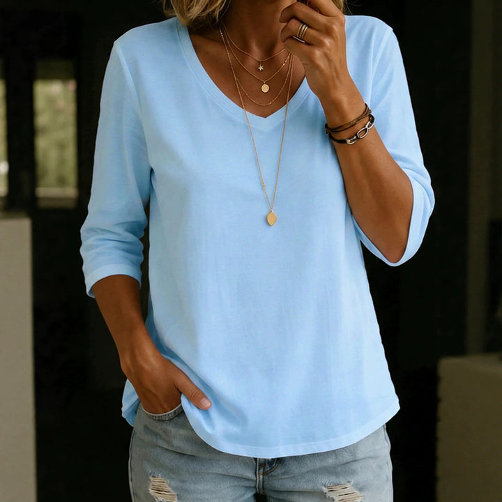 Women's Loose V-Neck Shirt with 3/4 Sleeves and Rounded Hem Mune Fashion