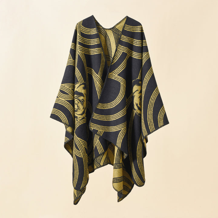 Ladies' collarless jacquard cape in a boxy oversized style with abstract medallion pattern