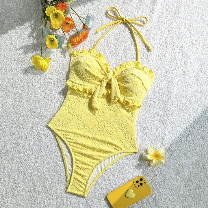 Women's swimsuit with playful ruffle design and trendy knot detail Mune Fashion