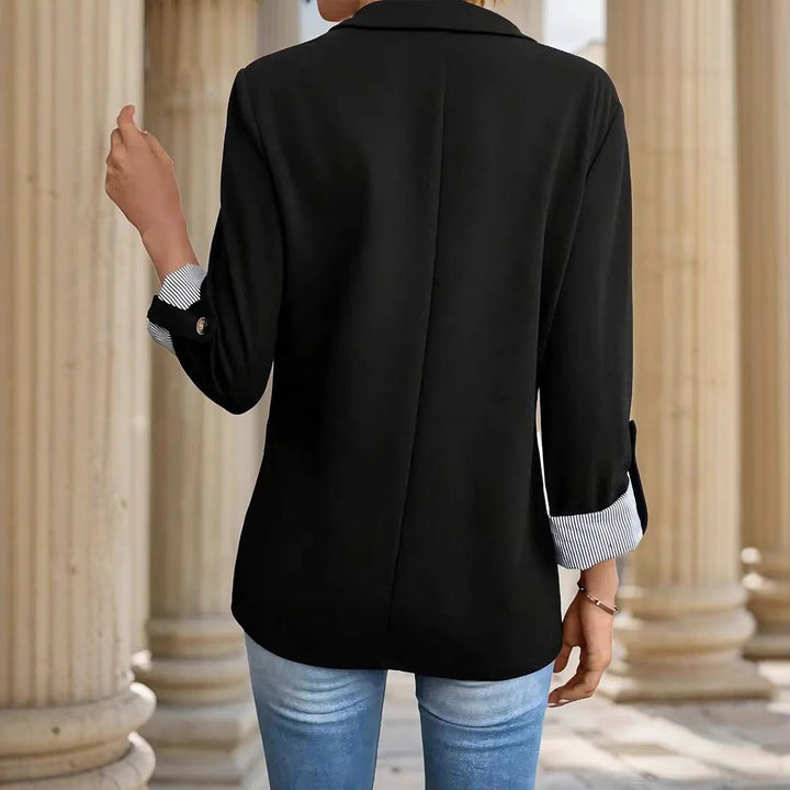 Women's tailored three-quarter sleeve blazer with flap pockets and turned-up cuffs Mune Fashion