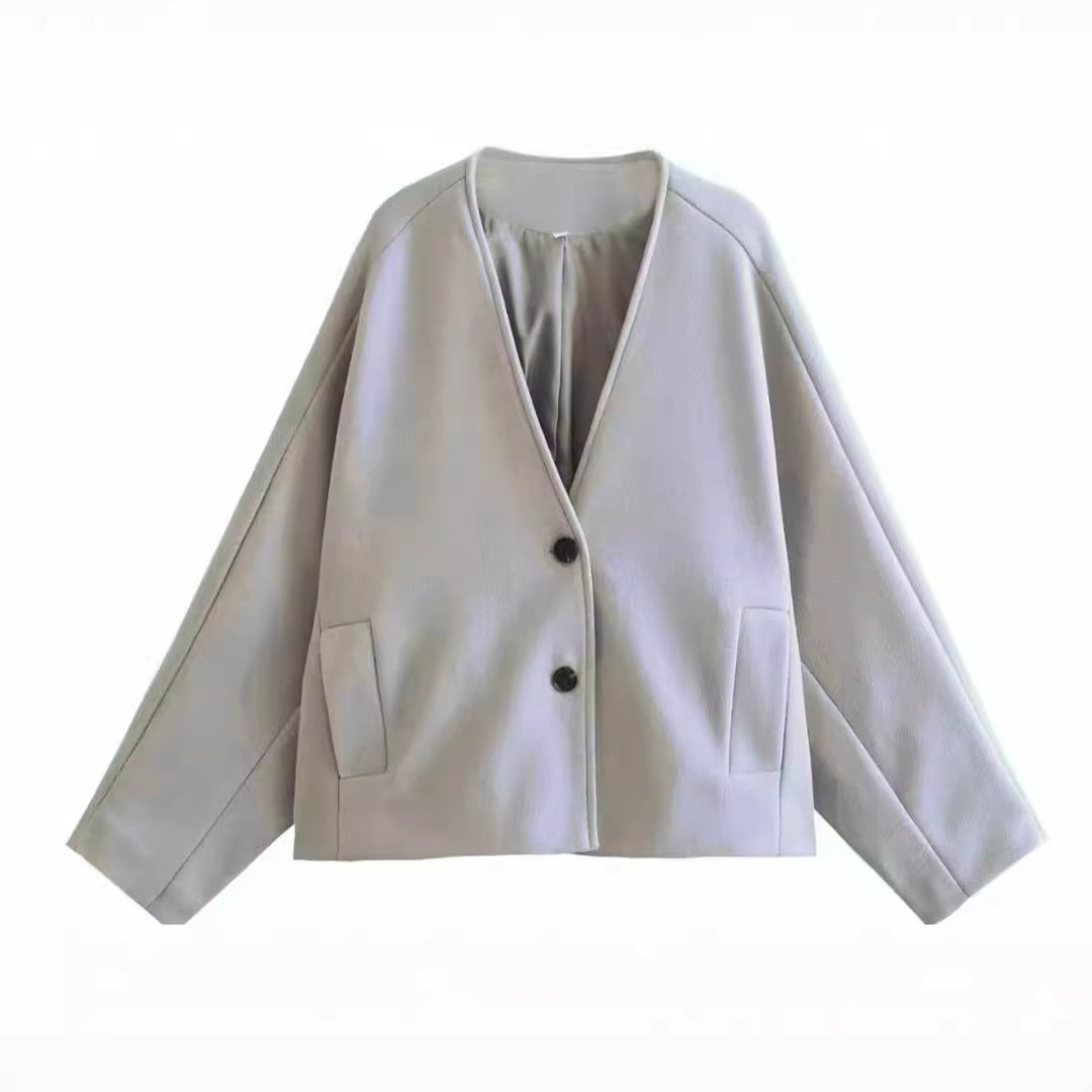 Women's oversized V-Neck short jacket made of wool blend with raglan sleeves and patch pockets Mune Fashion