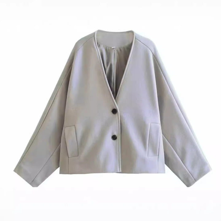 Women's oversized V-Neck short jacket made of wool blend with raglan sleeves and patch pockets Mune Fashion