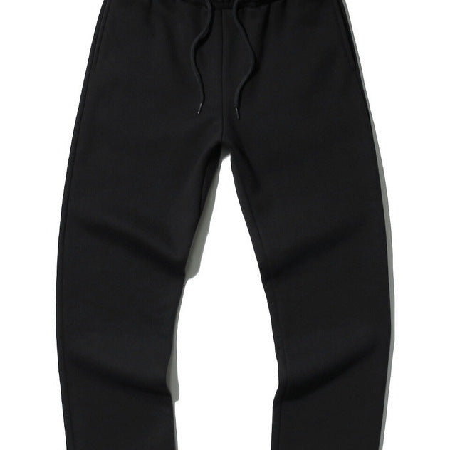 Unisex modern Relax Jogging pants with elastic drawstring waistband, side pockets, and tapered leg Mune Fashion