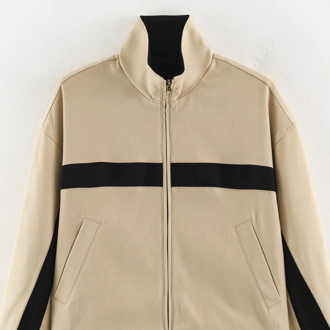 Women's sporty cropped track jacket with stand-up collar and contrasting side stripes Mune Fashion