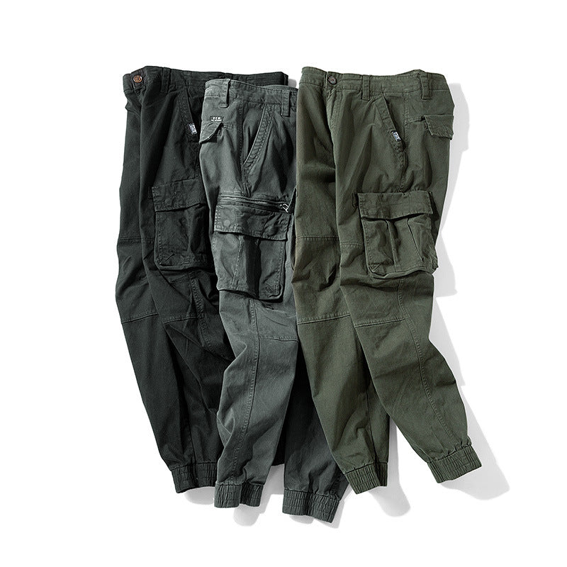 Men's tapered cargo pants in jogger style with knee patches, multiple pockets, and elastic ankle cuffs Mune Fashion