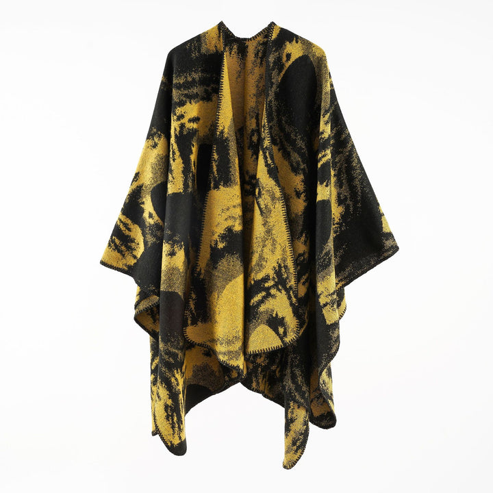 Ladies oversized jacquard cape made of wool blend with graphic watercolor pattern and overlock edge Mune Fashion