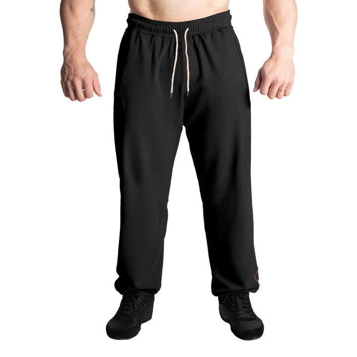 Men's casual jogging pants with elastic drawstring waistband, subtle side stripe, and deep side pockets Mune Fashion
