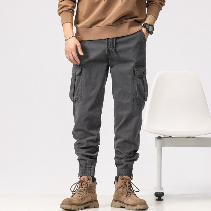 Men's Multifunctional Cargo Jogger Pants with Zip Leg Opening and Large Flap Pockets Mune Fashion