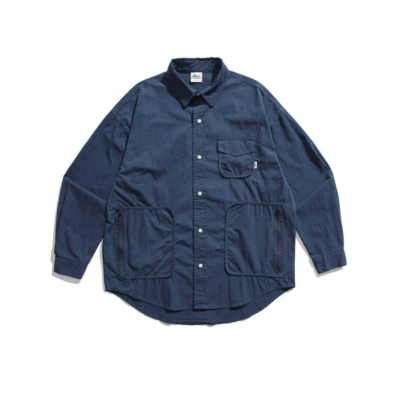 Unisex Boxy Overshirt Jacket with utility pockets, rounded hem, and oversized fit Mune Fashion